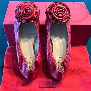 RED Valentino Red Flats with Elegant Rose Embellishments